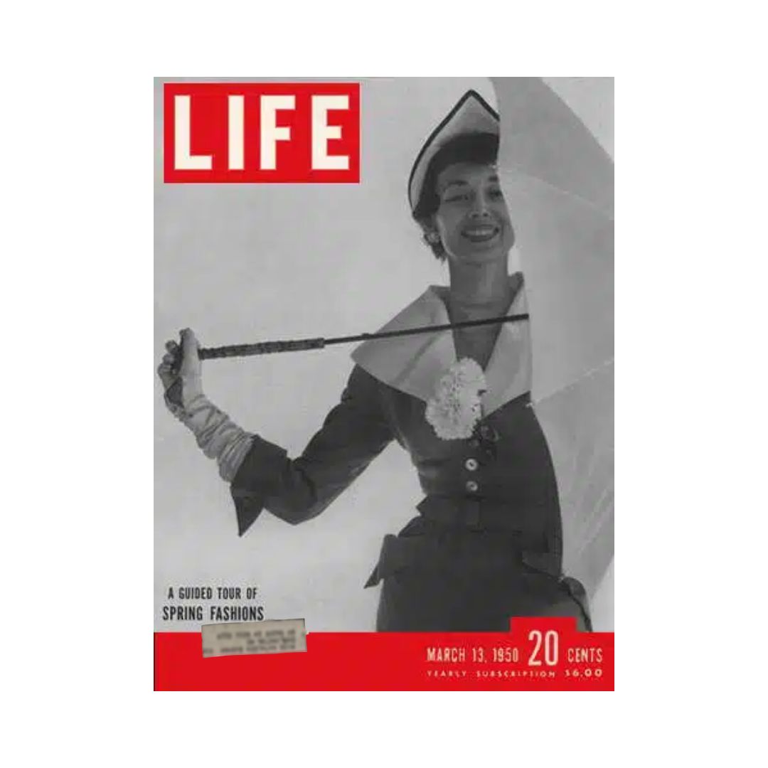 Cover of VTG Life Magazine March 13, 1950 showcasing spring fashion with a model holding a fashionable umbrella, reflecting vintage style.