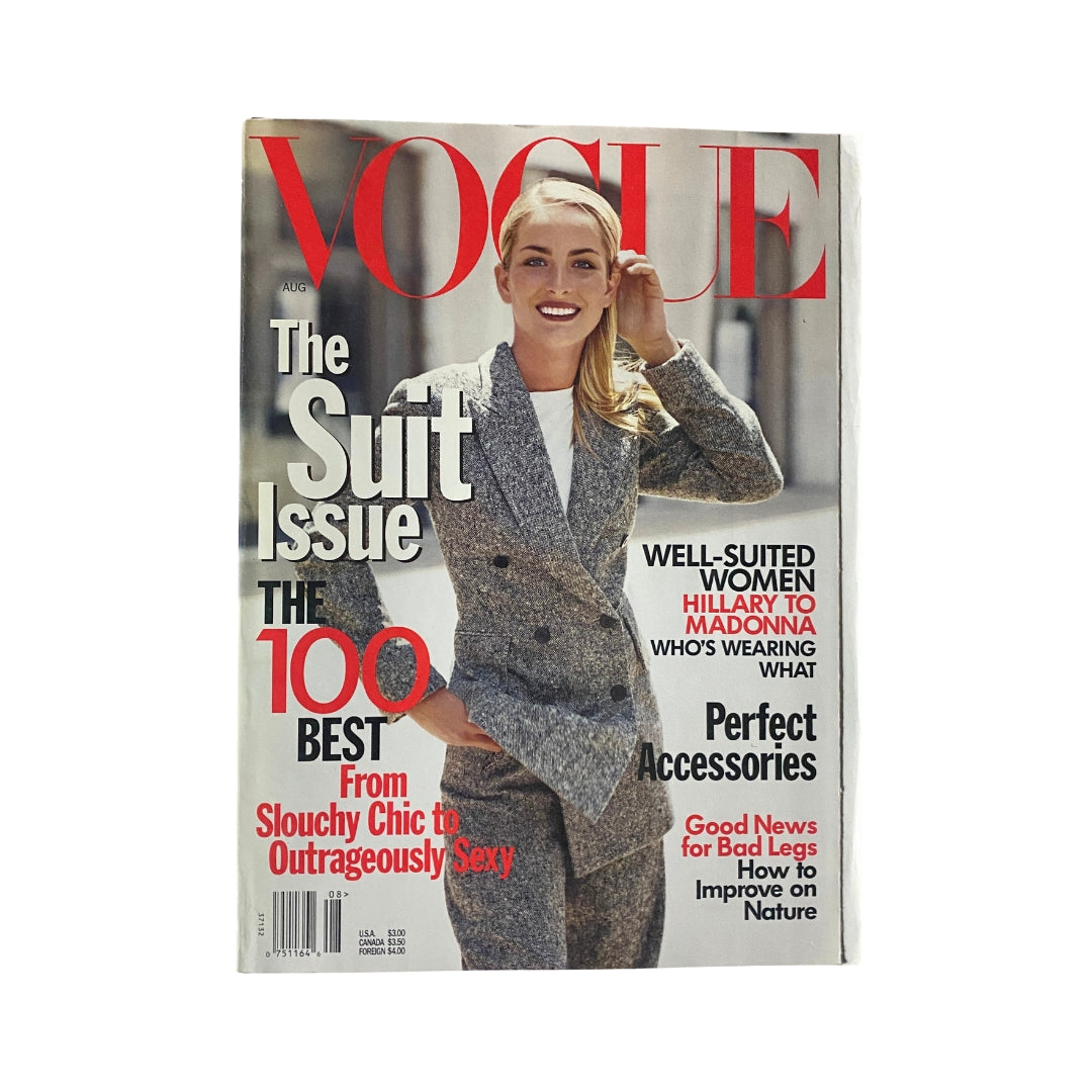 Vogue Magazine August 1997 featuring Georgina Grenville on the cover, titled 'The Suit Issue', showcasing fashion themes and style.