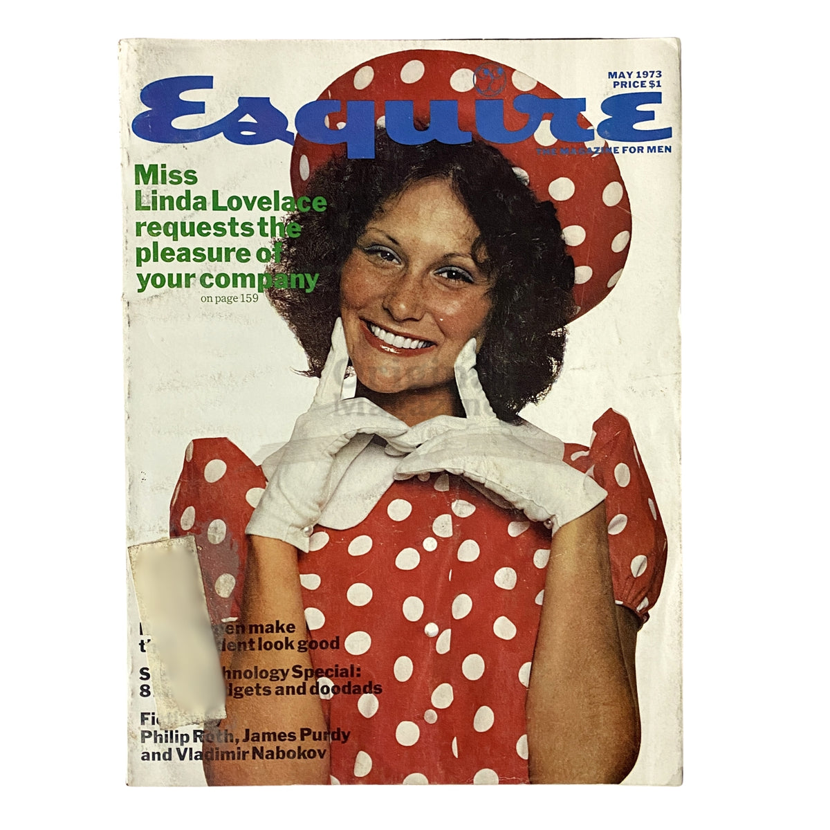 Esquire Magazine May 1973 cover featuring Miss Linda Lovelace in a polka-dot dress and hat, capturing a moment in 1970s pop culture.