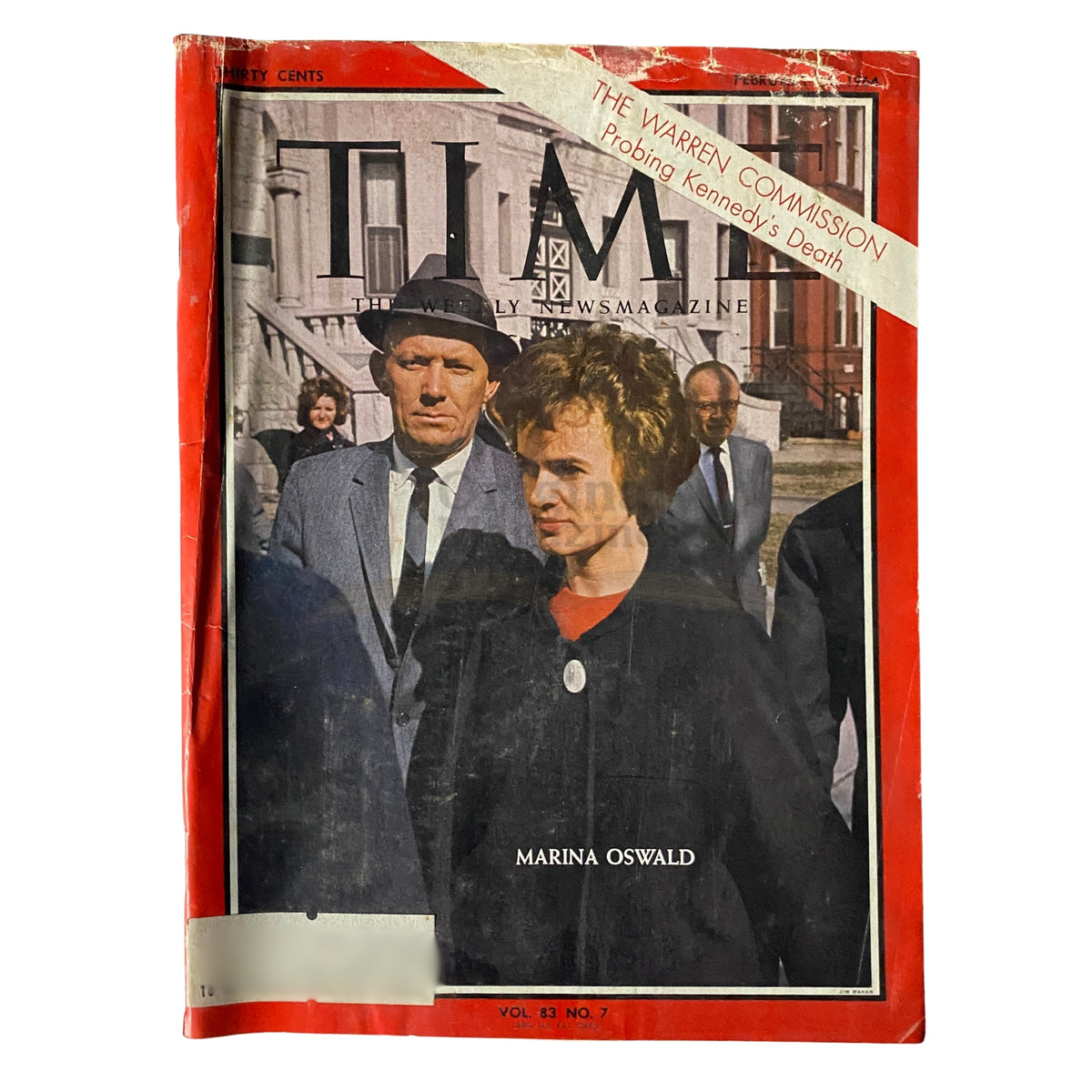 Cover of Time Magazine February 14, 1964 Vol 83 No. 7 featuring Marina Oswald, depicting a serious moment amid a historical backdrop.