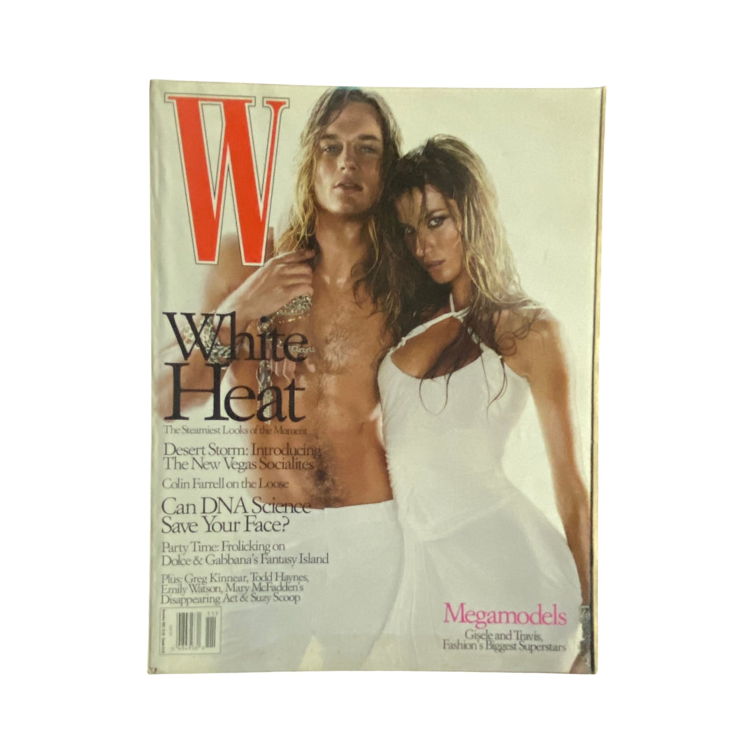 Cover of W Magazine November 2002 featuring Gisele Bündchen and Travis Fimmel, showcasing fashion and celebrity culture.