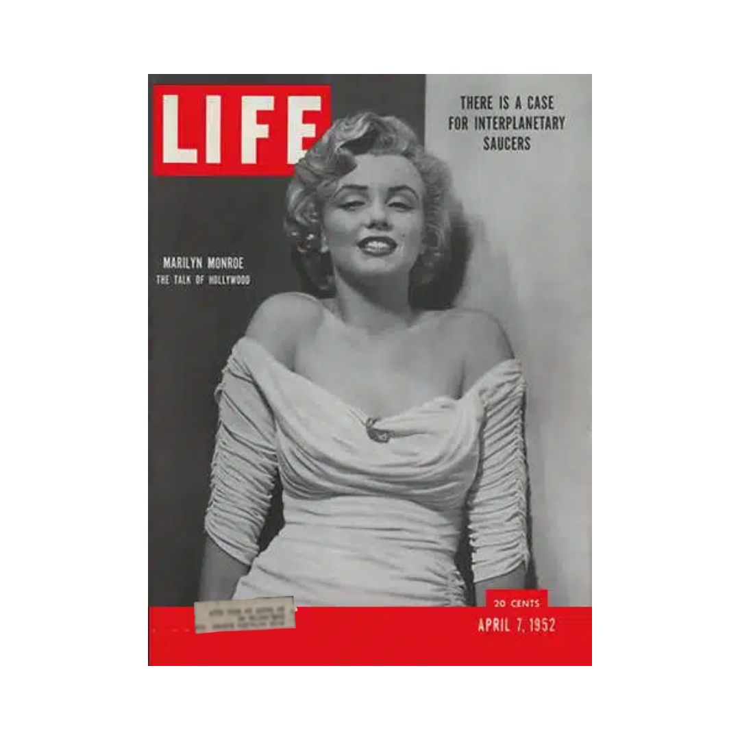 Vintage Life Magazine cover from April 7, 1952 featuring Marilyn Monroe with the title 'The Talk of Hollywood'. The cover displays a classic image of Monroe, highlighting her iconic style and beauty, alongside text about interplanetary saucers.