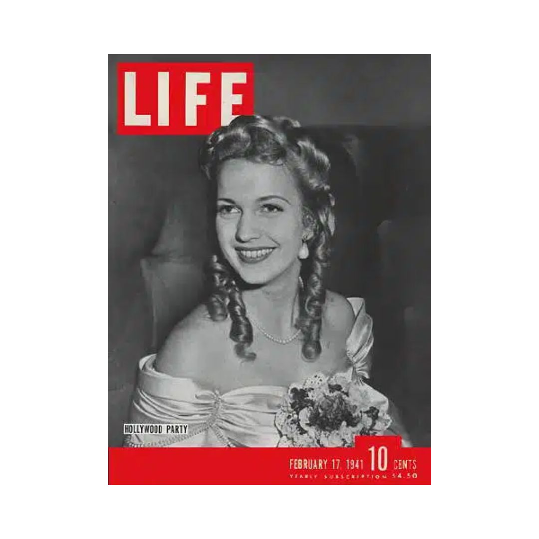 Cover of VTG Life Magazine February 17, 1941 featuring a Hollywood party theme, showcasing a woman with curly hair dressed elegantly, capturing the glamour of the era.
