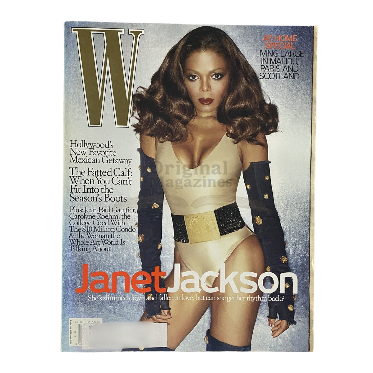 W Magazine October 2006 cover featuring Janet Jackson, showcasing her transformation and style evolution, includes a fashion-forward look with stunning designs, reflecting pop culture history.