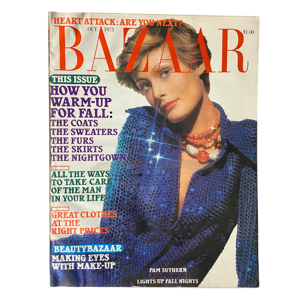 Cover of Harper's Bazaar Magazine October 1973 featuring Pam Suthern in a blue sequined outfit, showcasing classic fashion trends and details from that era.