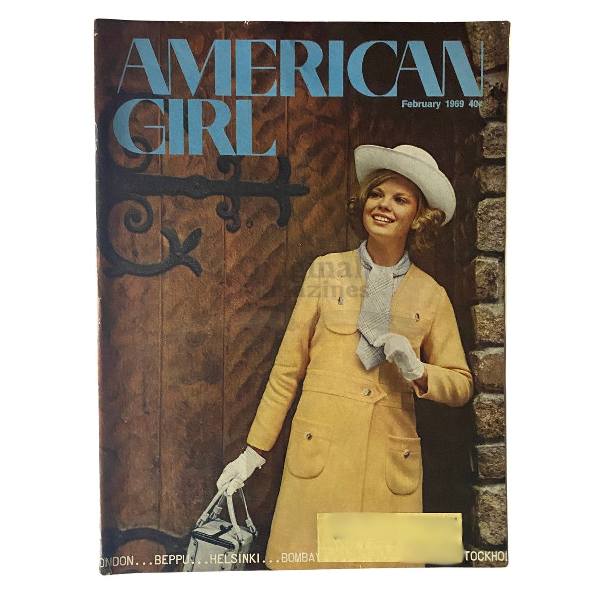 Cover of American Girl Magazine, February 1969, featuring an elegantly dressed girl in a yellow coat and white hat, showcasing vintage fashion from the 1960s.