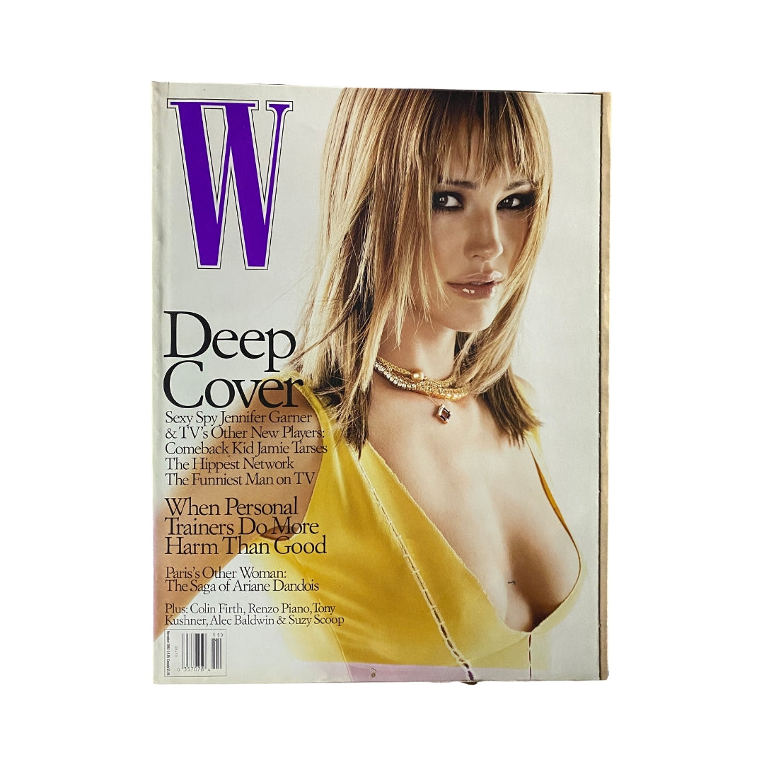 W Magazine November 2003 cover featuring actress Jennifer Garner in a striking yellow outfit, showcasing beauty and fashion from a dynamic era.