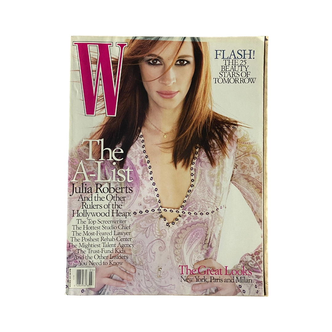 W Magazine March 2002 featuring Julia Roberts on the cover, showcasing a stunning portrait of the actress in a stylish outfit, reflecting the glamor of early 2000s fashion. This collectible issue also highlights articles about Hollywood and pop culture.