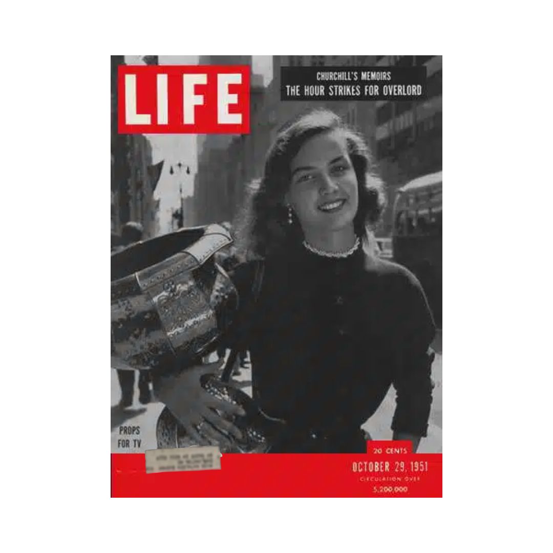 VTG Life Magazine October 29, 1951 cover featuring the Television Prop Girl, showcasing a historic moment in media with an engaging image of a woman holding a decorative pot in an urban setting.