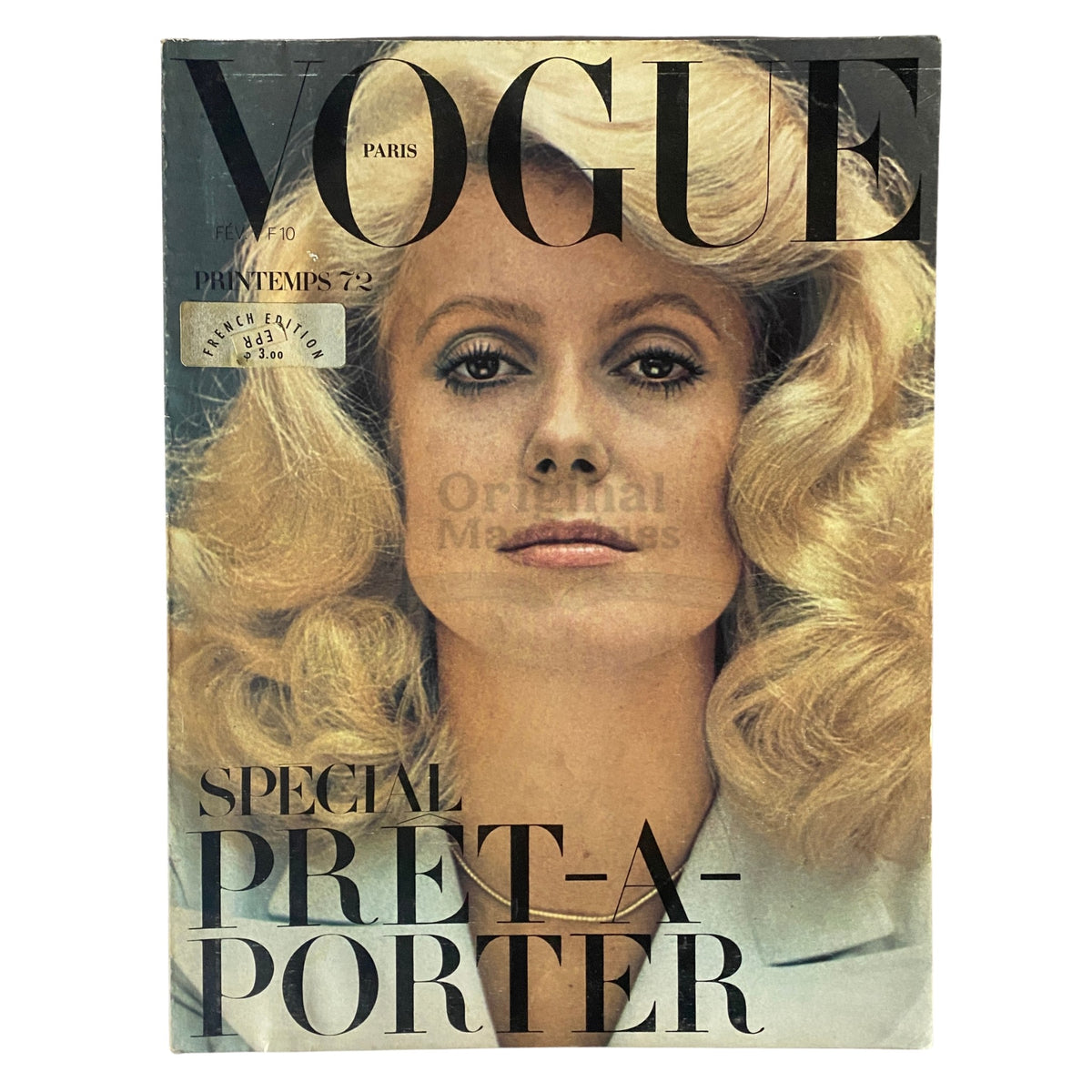 Cover of Vogue Paris Magazine February 1972 featuring Catherine Deneuve, showcasing classic 1970s fashion elegance.