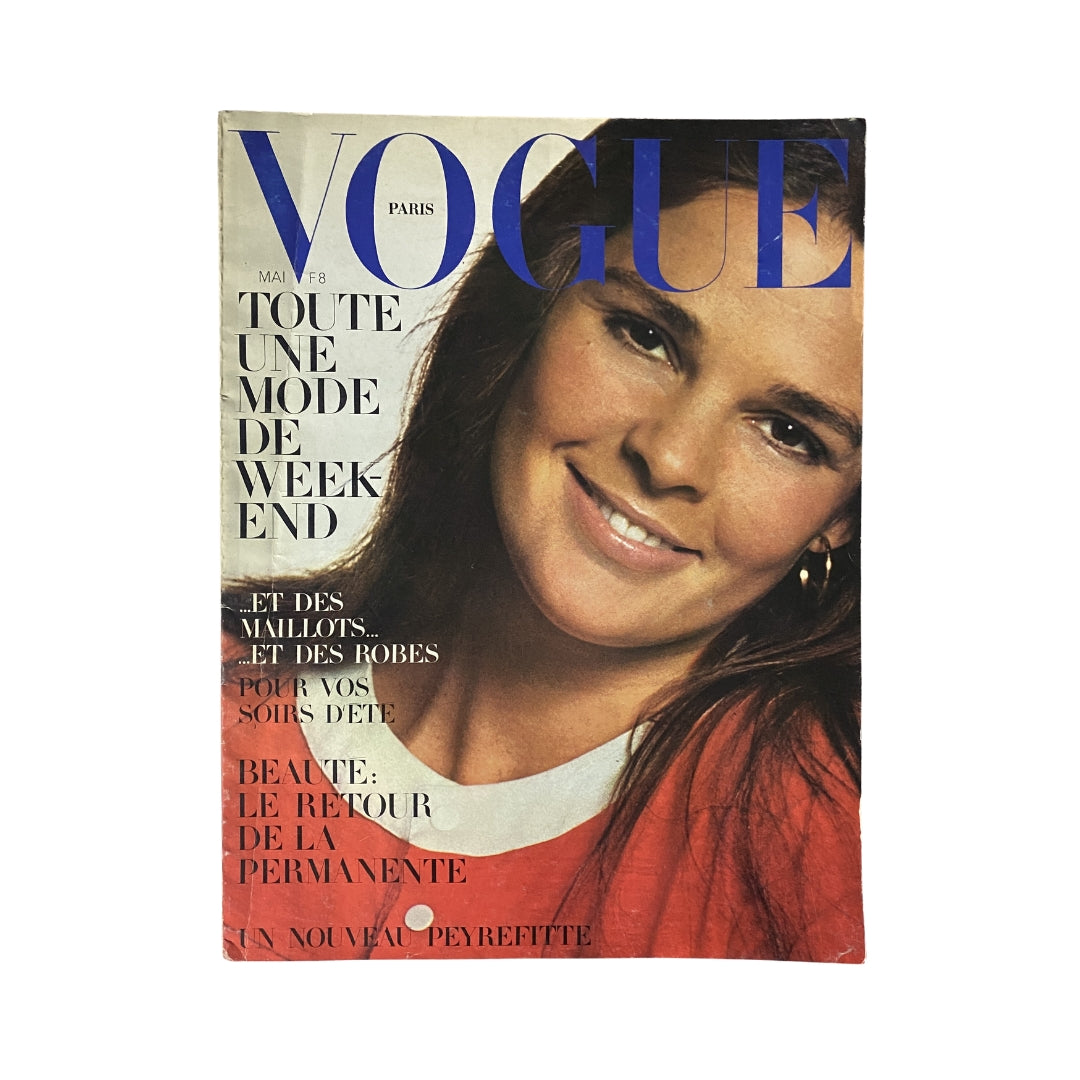 Vogue Paris Magazine May 1971 Ali MacGraw Cover No Label featuring a close-up image of a smiling woman with long hair. This vintage fashion magazine showcases iconic early '70s style.