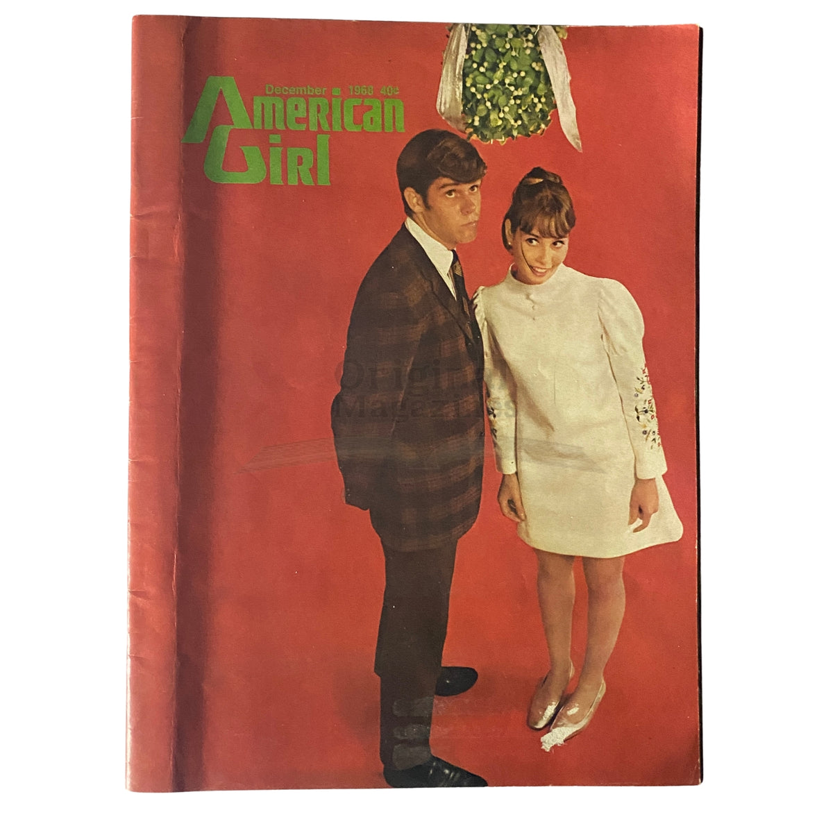 Cover of American Girl Magazine December 1968 featuring the title and a couple in vintage attire, symbolizing the culture of the late 1960s.