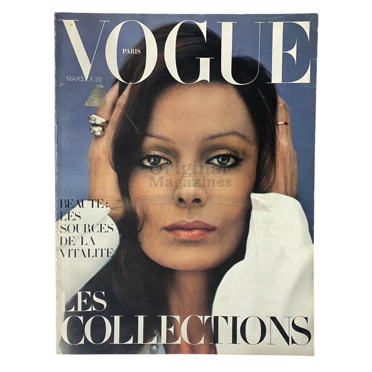 Cover of Vogue Paris Magazine March 1972 featuring French actress Marie Laforêt, highlighting beauty and vitality, titled 'Les Collections'.