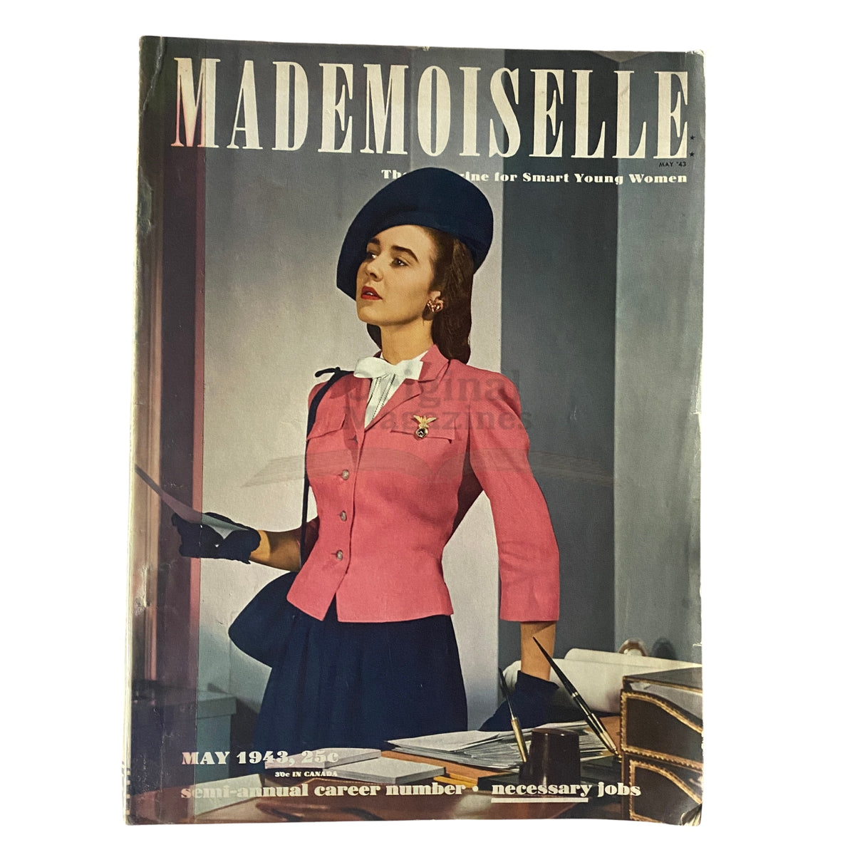 Cover of Mademoiselle Magazine May 1943 Semi-Annual Career Number featuring a woman in a vintage pink jacket and hat, portraying the professional fashion of the 1940s. A significant piece showcasing women in careers during World War II.