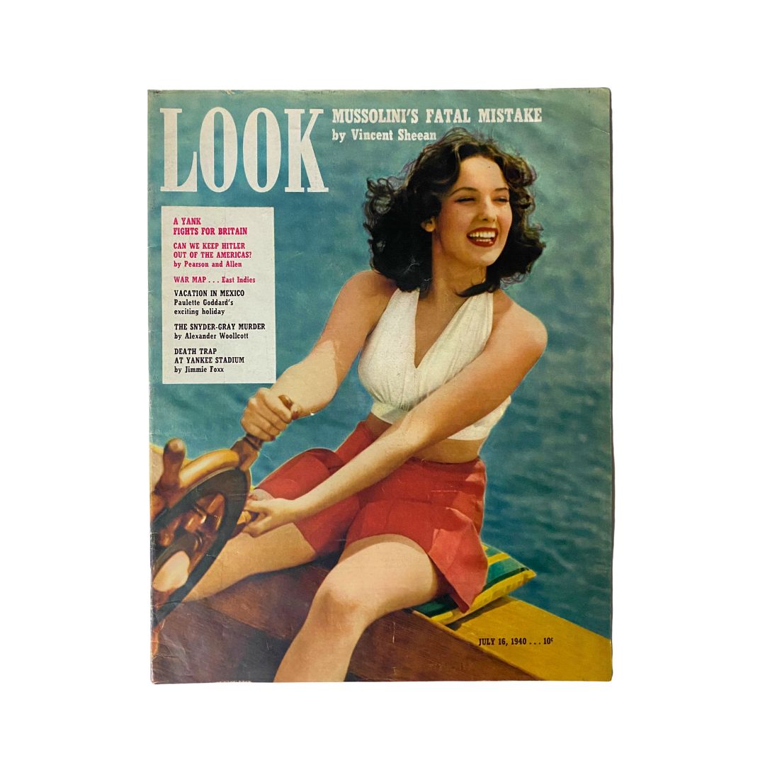 Vintage July 16, 1940 Look Magazine cover featuring a woman at the helm, with the title "Look Magazine July 16, 1940 Vol 4 No. 15 A Yank Fights for Britain" prominently displayed.