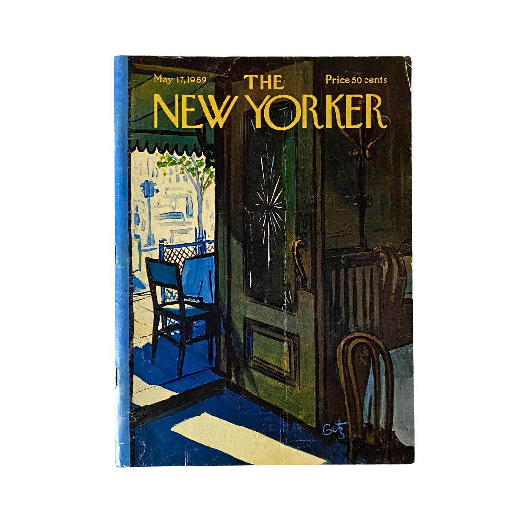 Cover of The New Yorker magazine dated May 17, 1969, illustrated by Arthur Getz, featuring an outdoor café scene with a table and chairs under a green awning.
