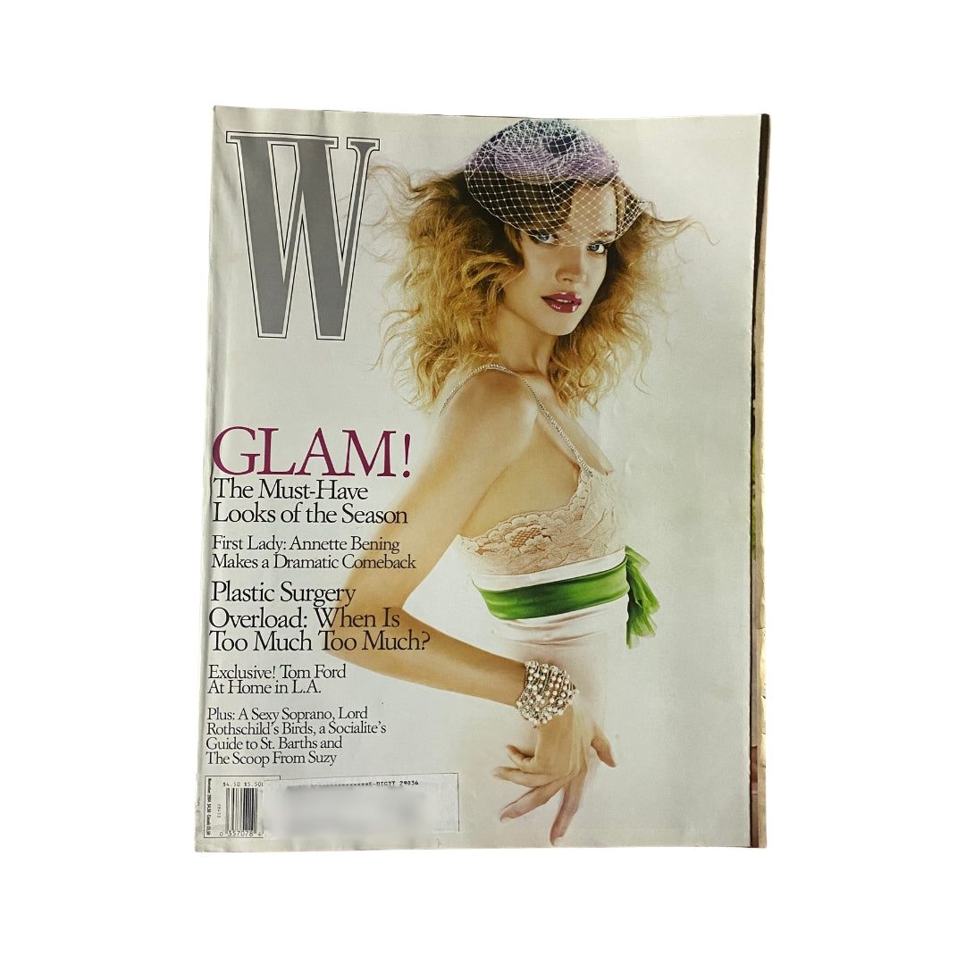 W Magazine November 2004 cover featuring Natalia Vodianova showcasing glamorous fashion looks of the season.