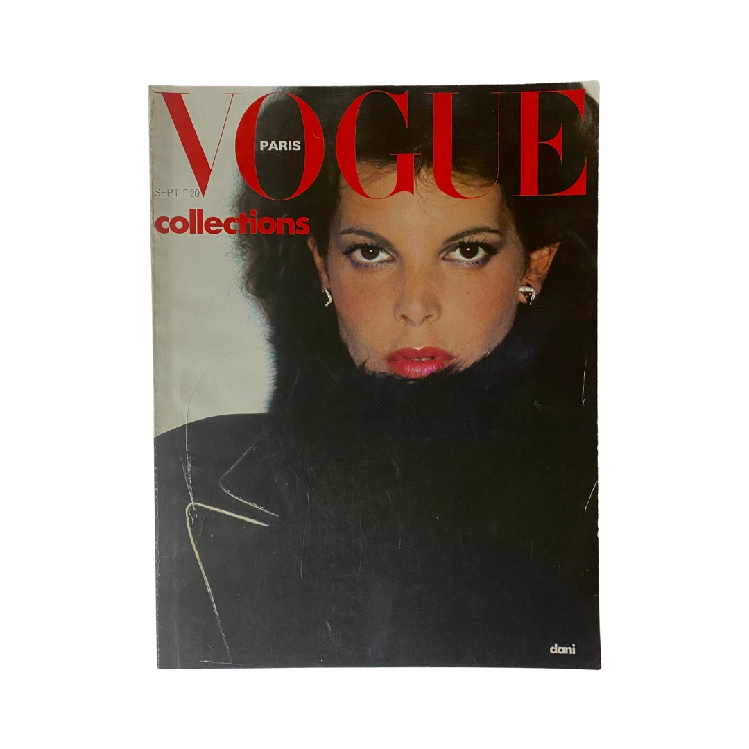 Vogue Paris Magazine September 1975 Janice Dickinson Cover featuring bold red lettering and a striking portrayal of Janice Dickinson in a fur coat.