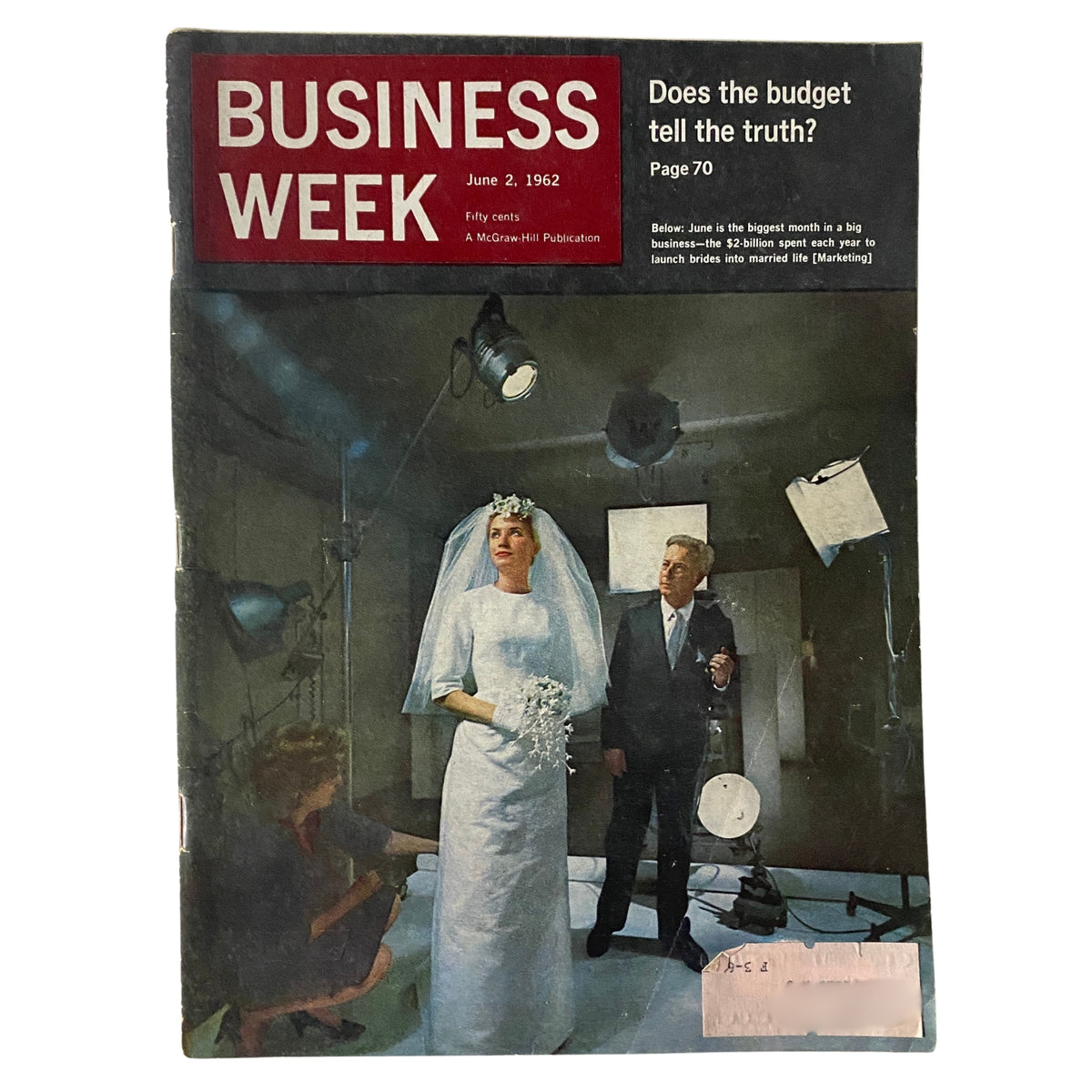 Cover of Business Week Magazine from June 2, 1962 titled 'Does The Budget Tell The Truth?', featuring a bride and groom in a studio setting.