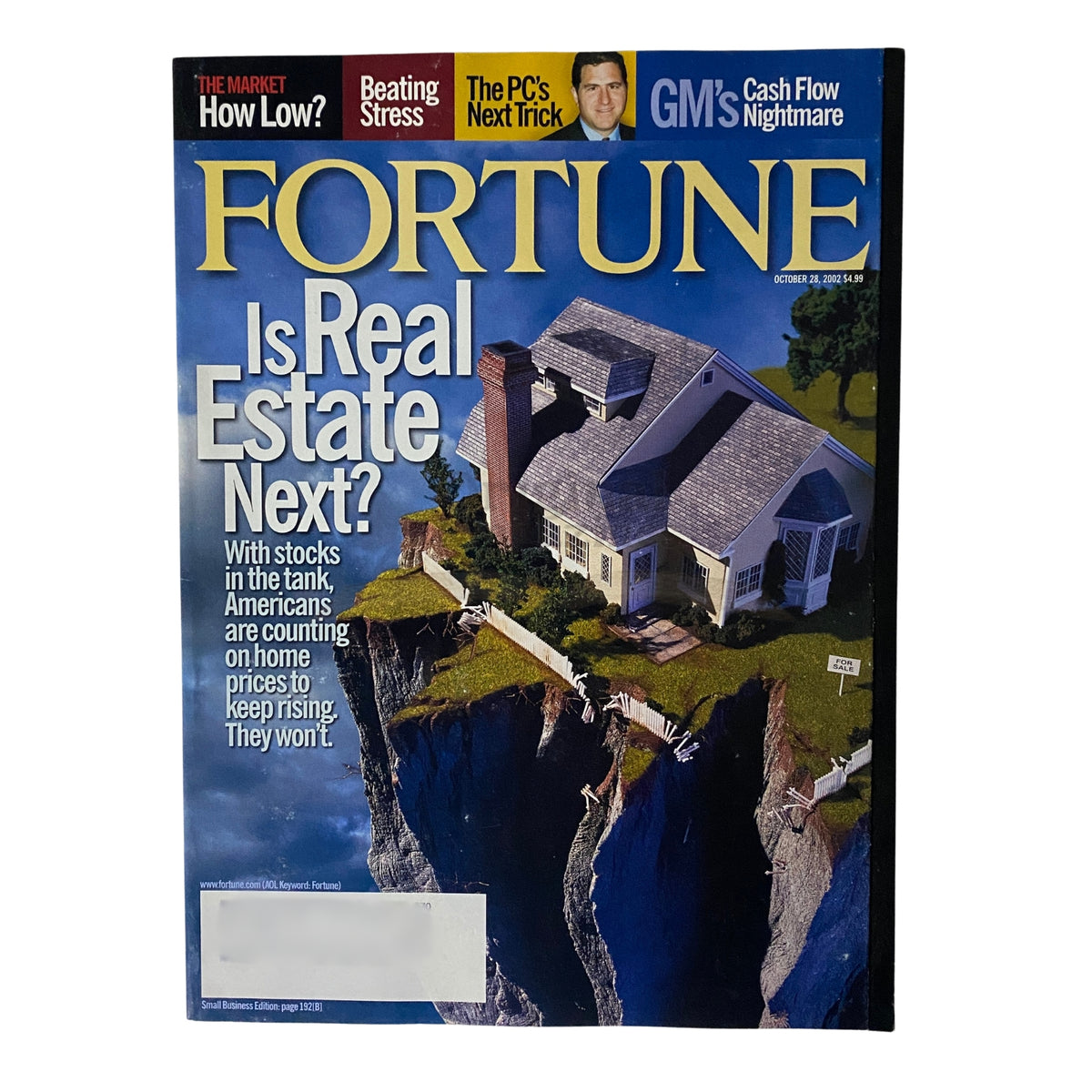 Fortune Magazine cover from October 28, 2002 featuring the title 'Is Real Estate Next?' with a striking image of a coastal house, highlighting real estate discussion amidst market fluctuations.