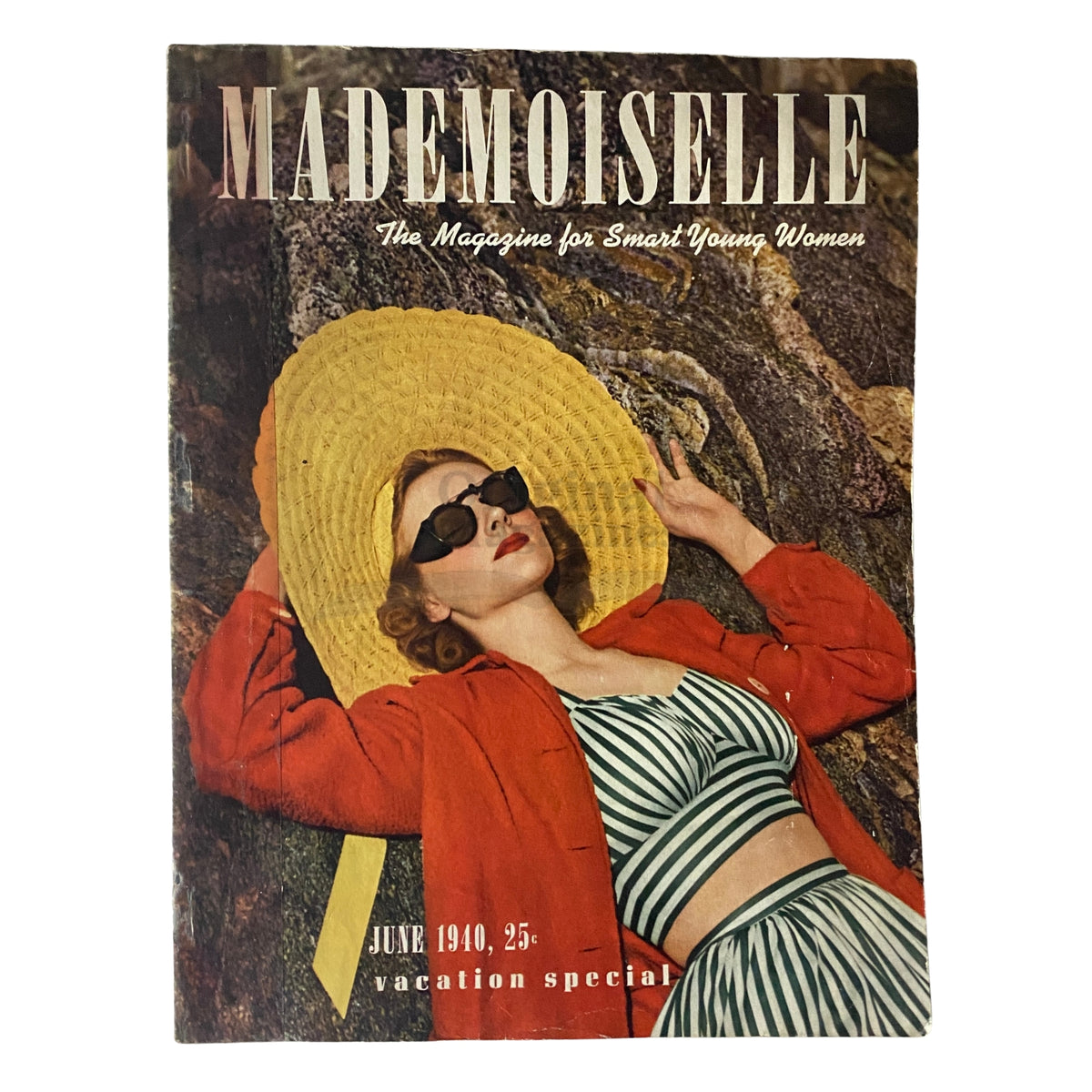 Cover of Mademoiselle Magazine June 1940 Vacation Special, featuring a woman in a sunhat and sunglasses, depicting summer fashion and leisure from the era.