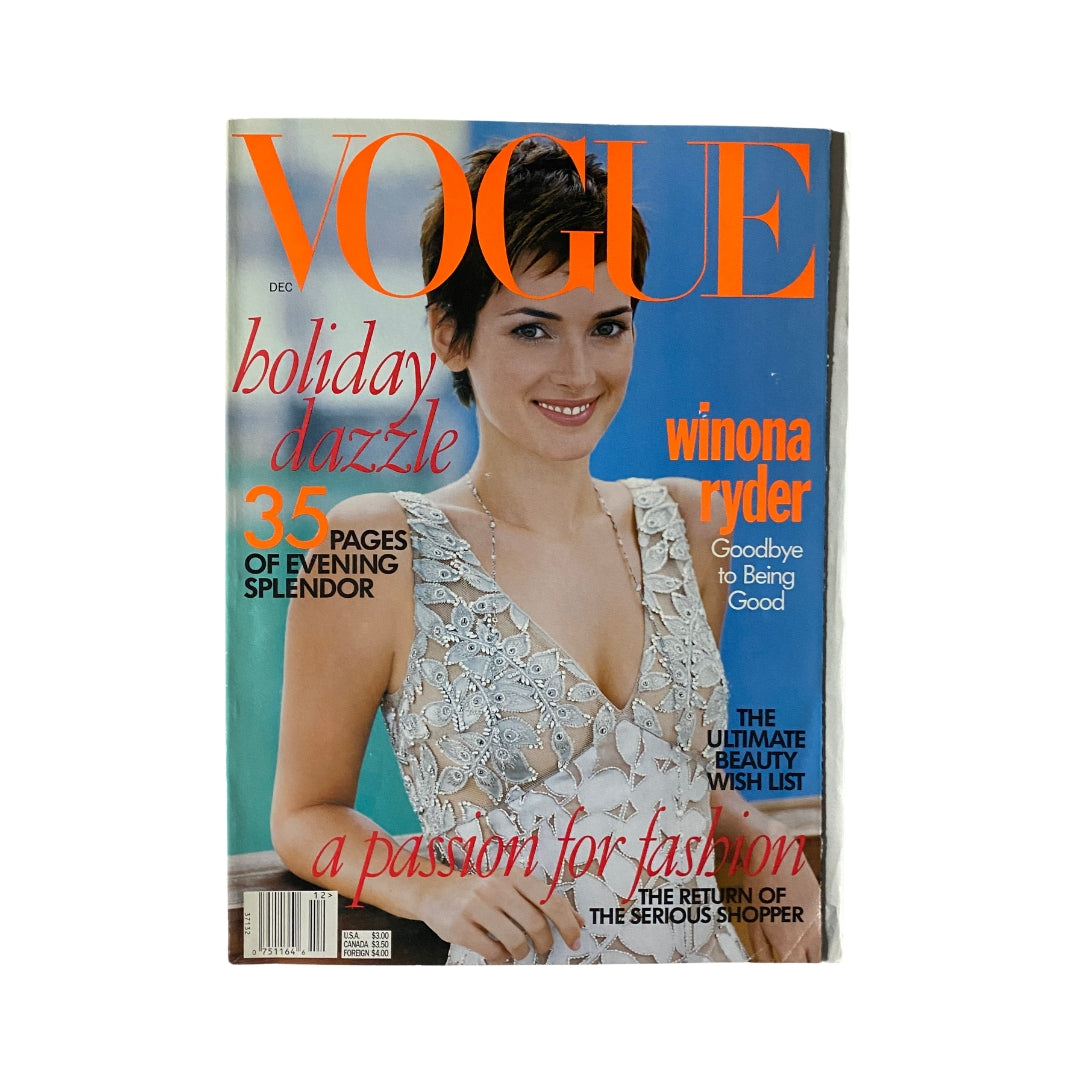 Vogue Magazine December 1996 featuring Winona Ryder on the cover, highlighting holiday fashion and beauty tips.