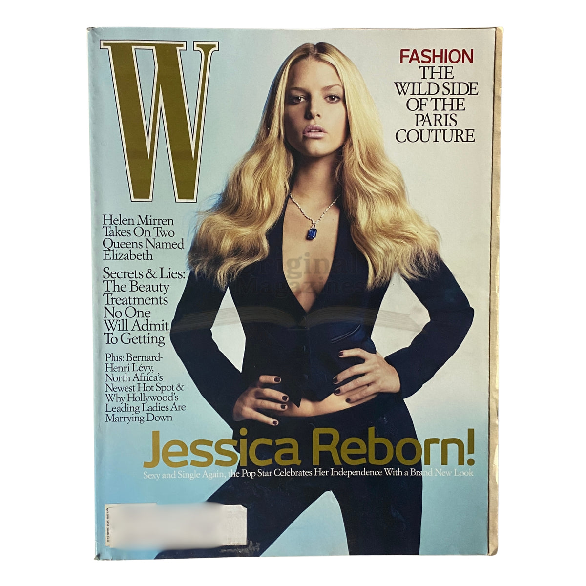 W Magazine April 2006 cover featuring Jessica Simpson in a chic Yves Saint Laurent outfit, styled by Marina Burini, highlighting the fashion trends of the mid-2000s.
