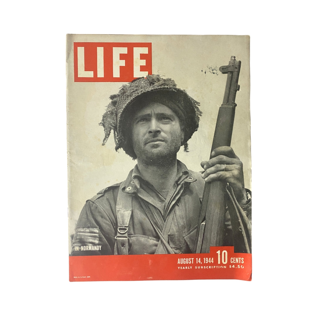 Life Magazine August 14, 1944 cover featuring a soldier in Normandy, showcasing a vintage World War II historical moment.