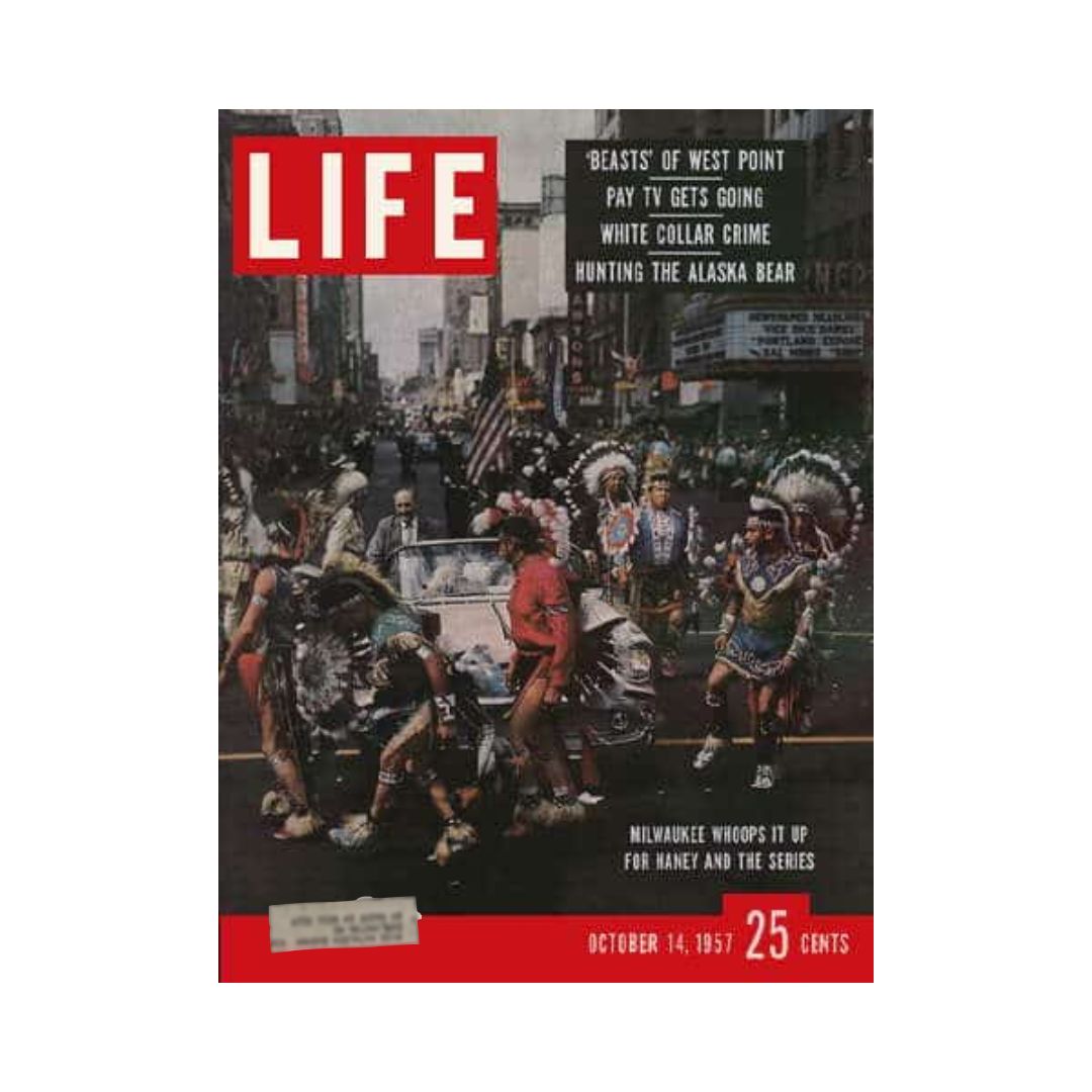 Cover of Life Magazine from October 14, 1957, featuring a vibrant parade scene celebrating the Milwaukee Braves vs New York Yankees matchup, highlighting the excitement of the World Series.