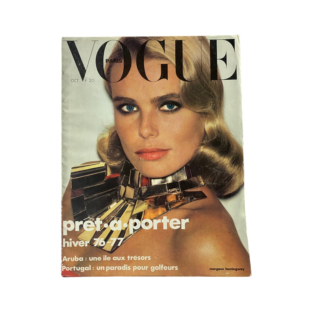 Vogue Paris Magazine October 1976 featuring Margaux Hemingway on the cover, showcasing vintage fashion styles with bold makeup and jewelry, ideal for collectors.