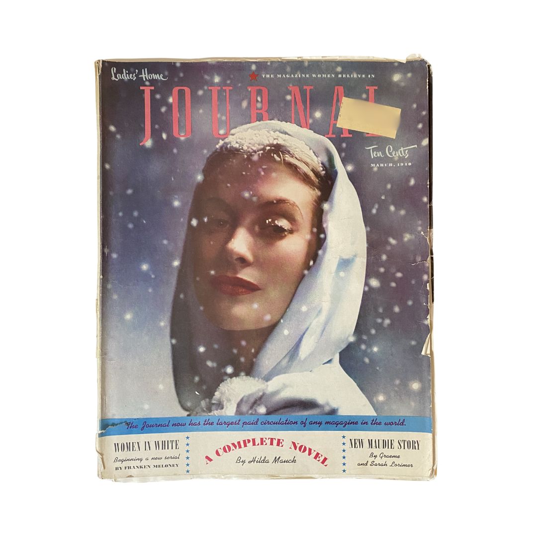 Ladies' Home Journal Magazine March 1940 cover showcasing a woman in white, reflecting winter themes and vintage fashion trends.