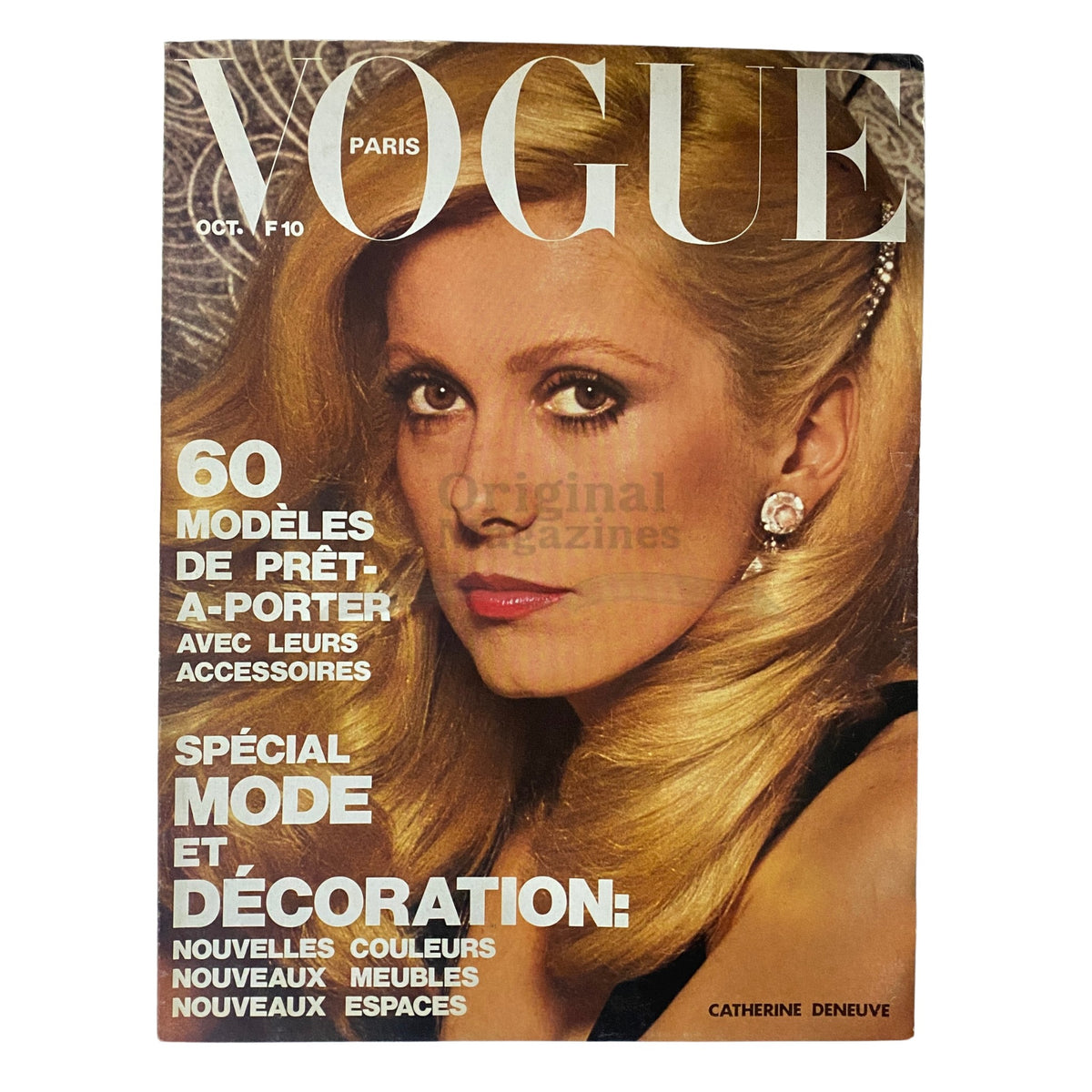 Cover of Vogue Paris Magazine October 1973 featuring Catherine Deneuve, showcasing 70s fashion trends and vintage culture.