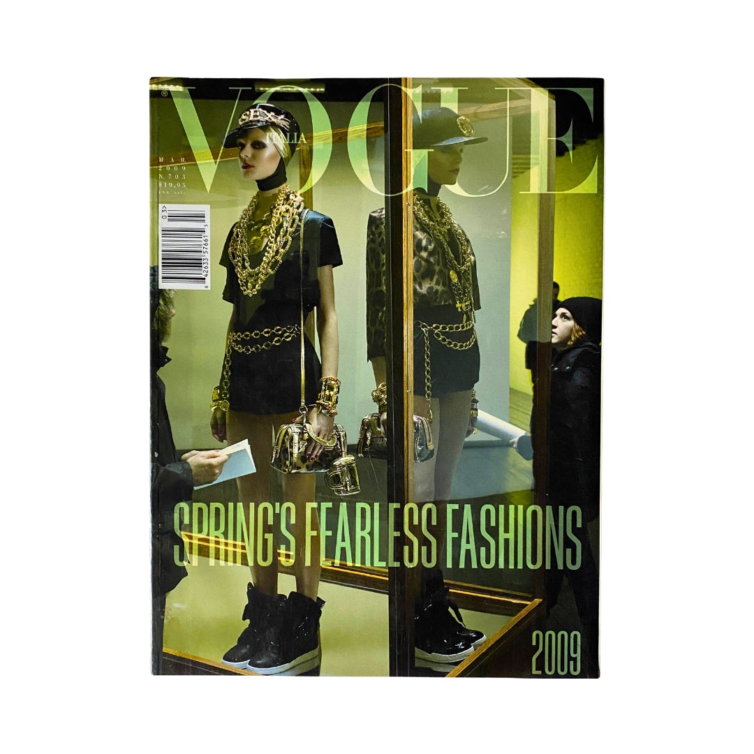 Vogue Magazine 2009 Spring's Fearless Fashions cover featuring a model in stylish attire surrounded by fashion accessories and mirrors.