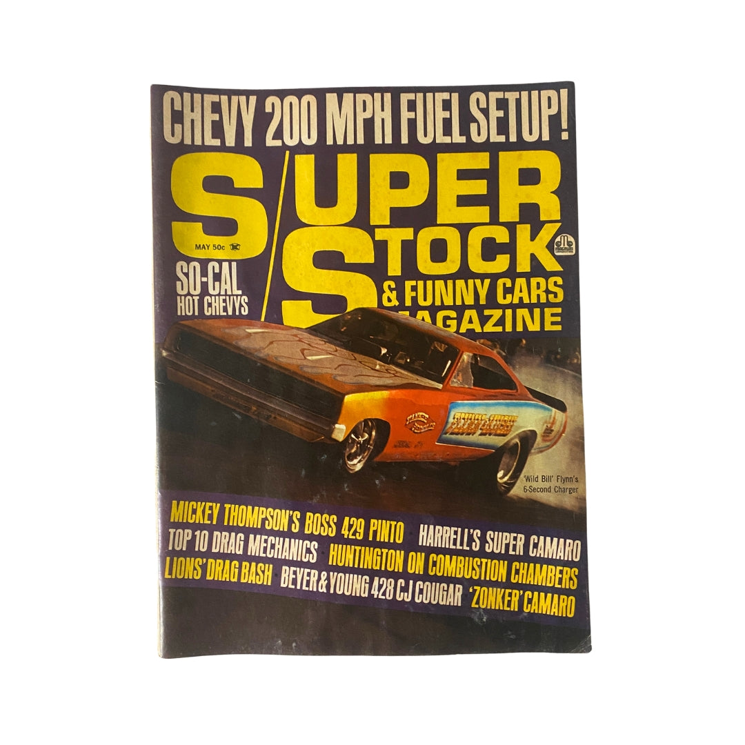 Vintage Super Stock Magazine from May 1969 featuring Wild Bill Flynn's 6-Second Charger on the cover, showcasing a drag racing car with bold text highlighting performance and features.