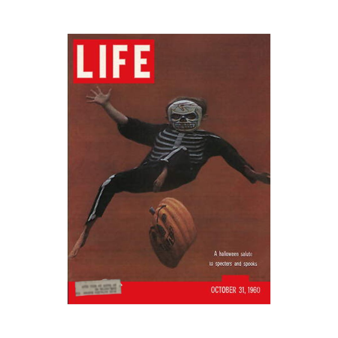 Cover of VTG Life Magazine October 31, 1960 featuring a Halloween theme with a child in a skeleton costume and a floating pumpkin, celebrating the issue's 'Salute to Specters and Spooks'.