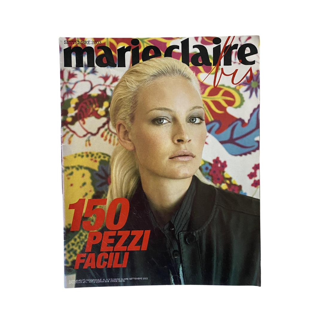 Cover of Marie Claire Italia Magazine September 2003 featuring model Sophie Boesen in a stylish outfit with vibrant floral background.
