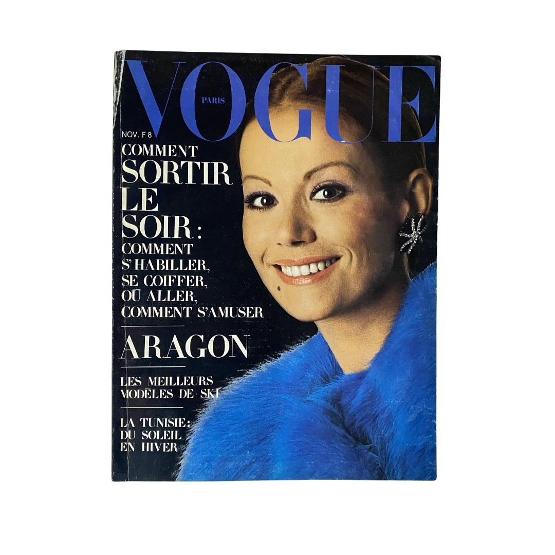 Vogue Paris Magazine November 1971 cover featuring Claudine Auger, showcasing a glamorous vintage fashion style with bold colors and chic design.