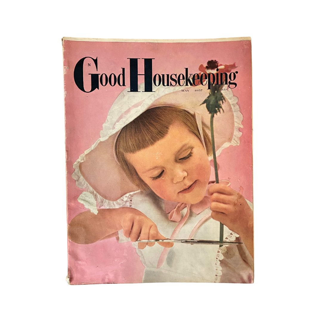 Cover of the VTG Good Housekeeping Magazine May 1957 featuring a young girl with a flower, showcasing vintage design.