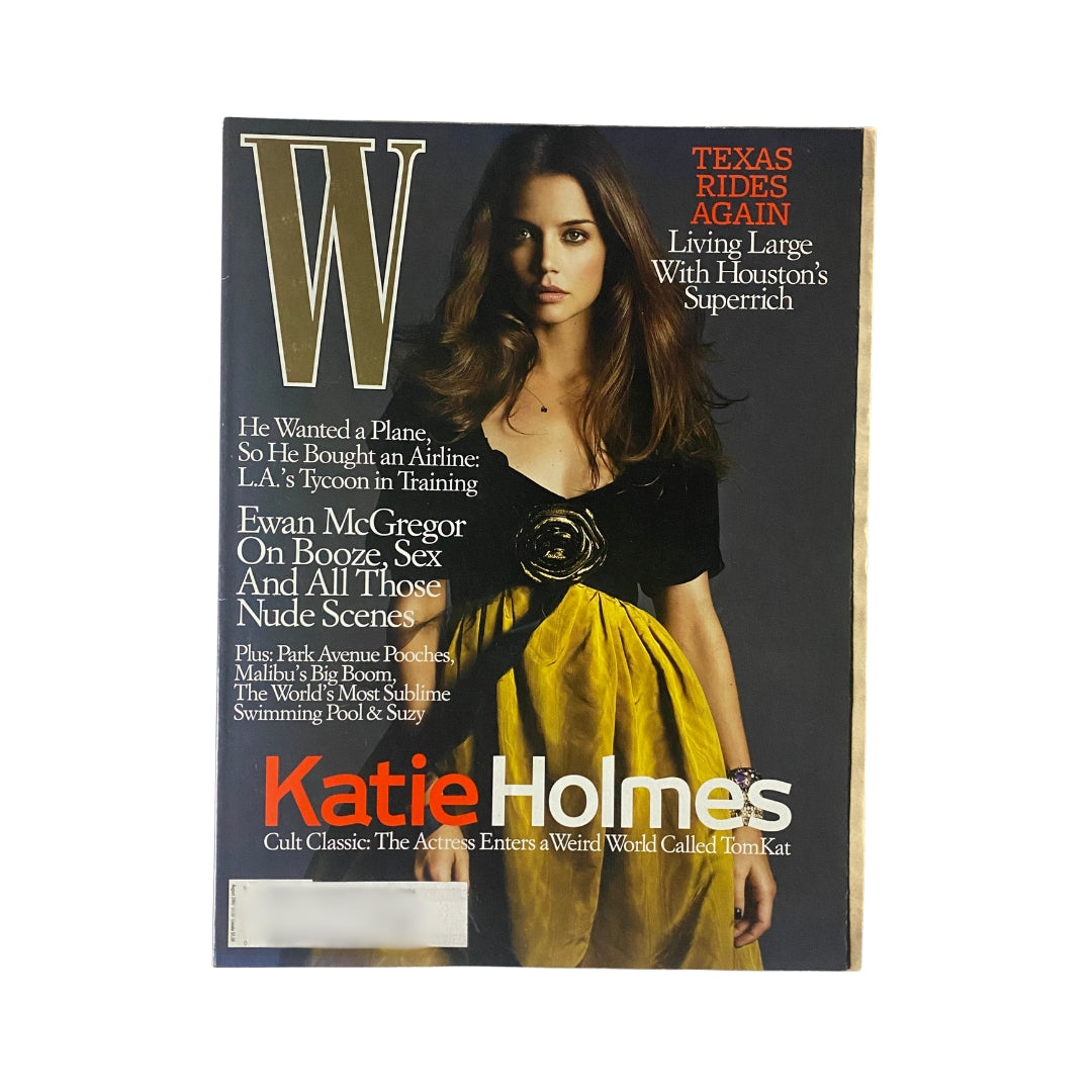 W Magazine August 2005 cover featuring actress Katie Holmes in a stunning dress, highlighting her iconic presence in pop culture.