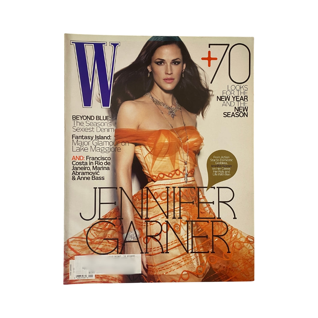 W Magazine January 2010 cover featuring actress Jennifer Garner, showcasing her elegance in a stunning orange dress with a statement necklace.