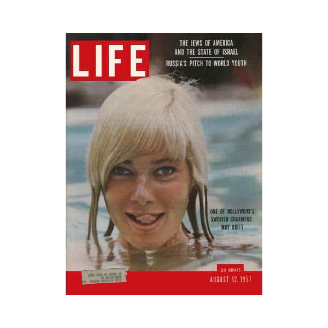 Life Magazine cover from August 12, 1957, featuring Hollywood's Swedish charmer May Britt, highlighting mid-20th century culture and glamour.