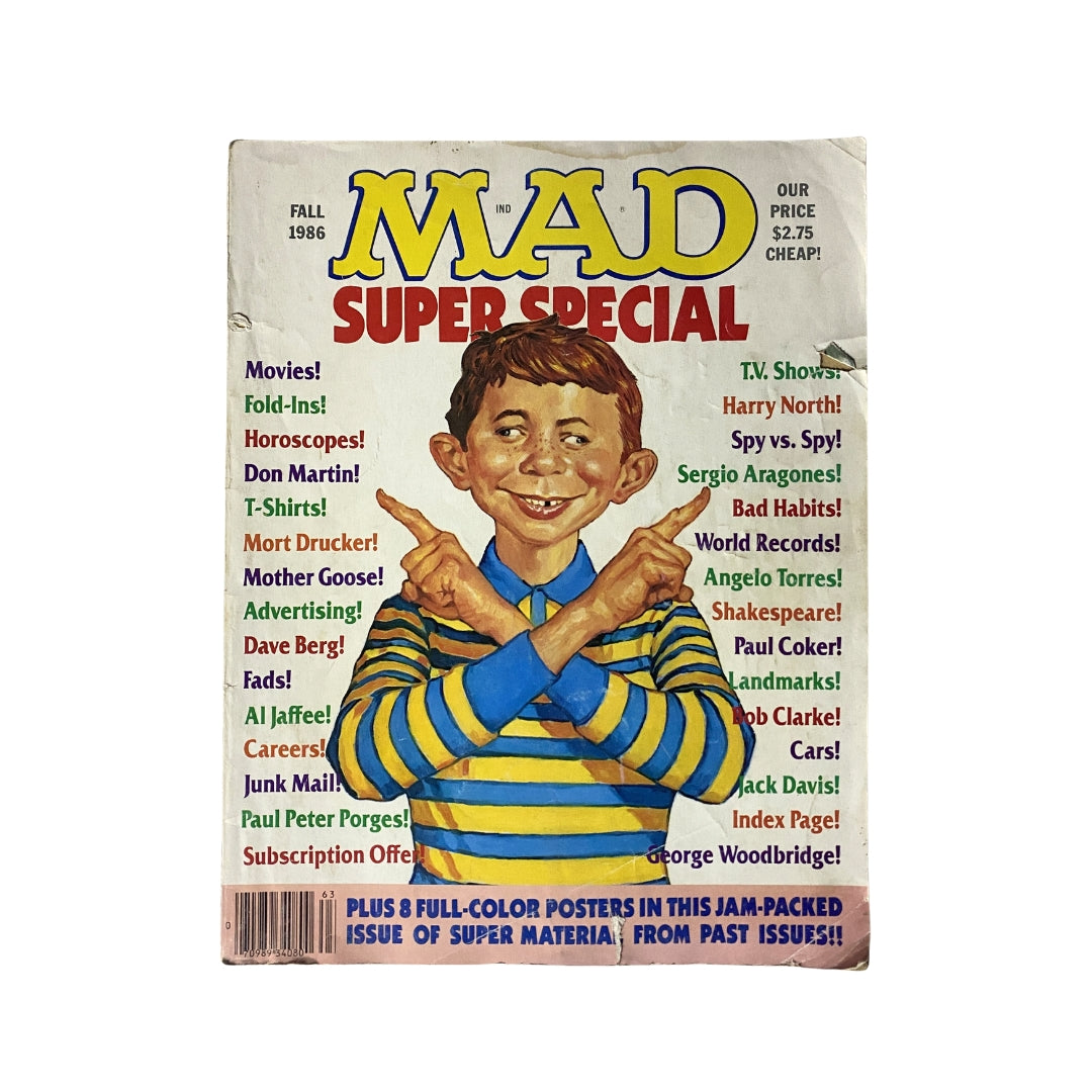 Cover of Mad Magazine Fall 1986 Super Special featuring George Woodridge's iconic artwork with a humorous character, highlighting sections on movies, horoscopes, and popular culture.
