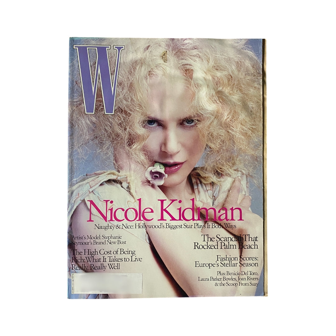 Cover of W Magazine from December 2003 featuring actress Nicole Kidman, renowned for her captivating style and presence in Hollywood.