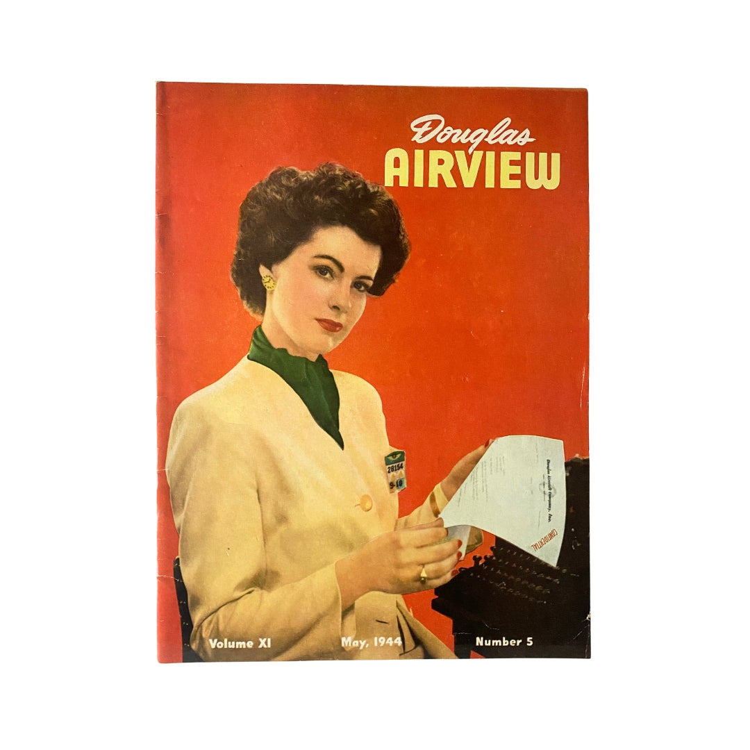 Cover of Douglas Airview Magazine, May 1944, featuring the Coconut Bombers, showcasing a woman in a vintage style outfit with an old typewriter.