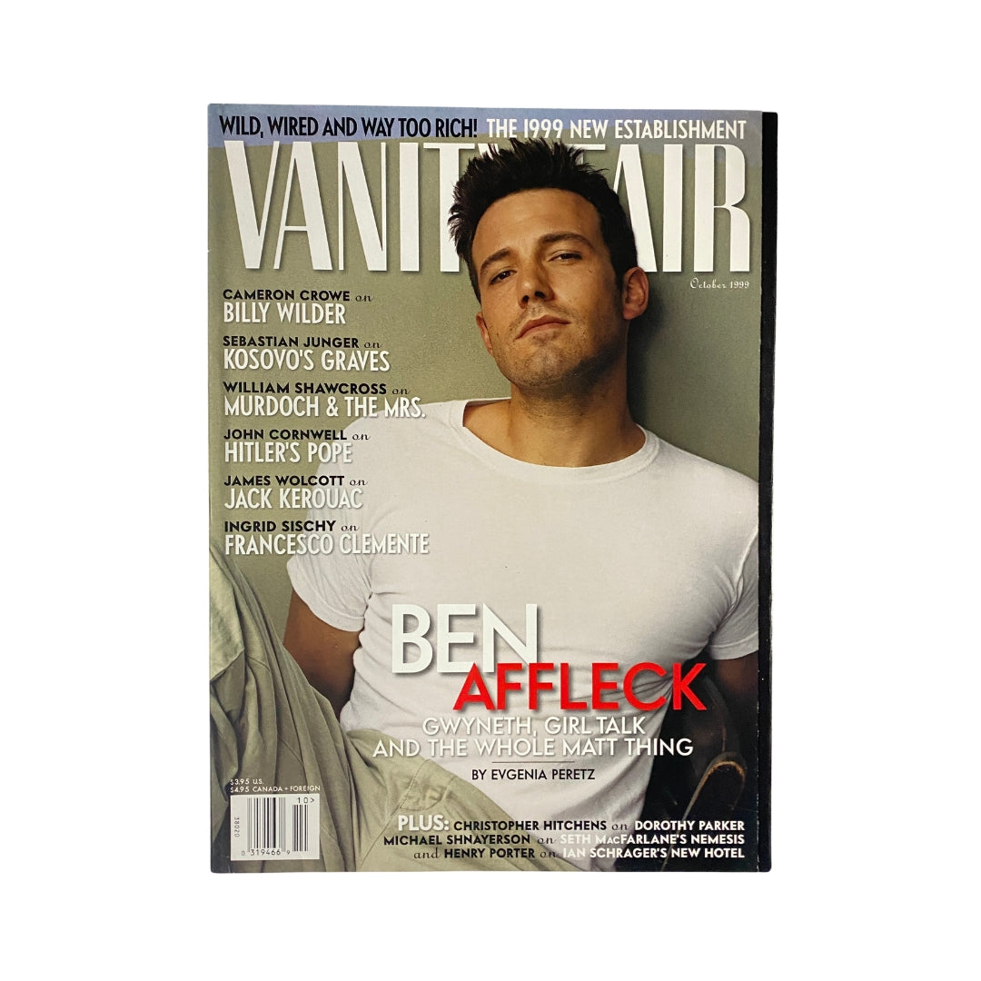 Vanity Fair Magazine October 1999 featuring Ben Affleck on the cover. The cover showcases a portrait of Affleck in a white shirt, highlighting his features and expressions. The magazine includes headlines and articles, capturing the essence of late-90s pop culture with insights into Affleck's rise to fame.