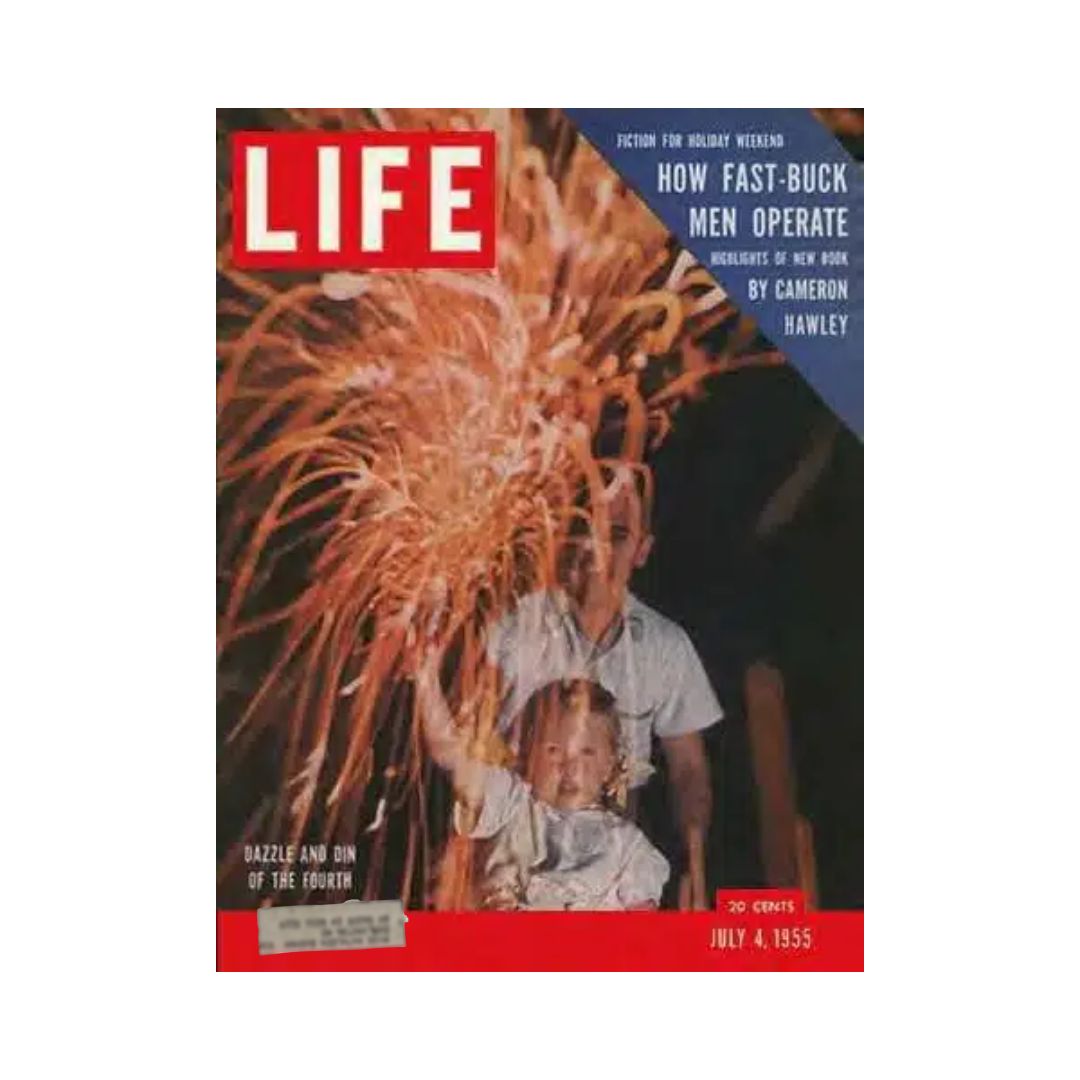 Cover of Vintage Life Magazine from July 4, 1955, featuring a child holding a sparkler and a man celebrating with fireworks. The title highlights 'Dazzle and Din of the Fourth' and includes the author's name Cameron Hawley, reflecting the festive spirit of Independence Day.