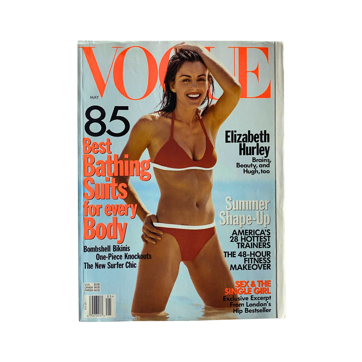 Vogue Magazine May 1998 edition featuring Elizabeth Hurley on the cover, highlighting a fashion statement with the title 'Best Bathing Suits for every Body.'