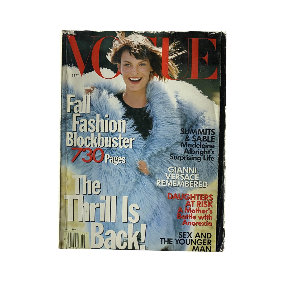 Vogue Magazine September 1997 featuring Linda Evangelista on the cover, showcasing a stunning blue fur coat, highlighting fall fashion trends and cultural insights.