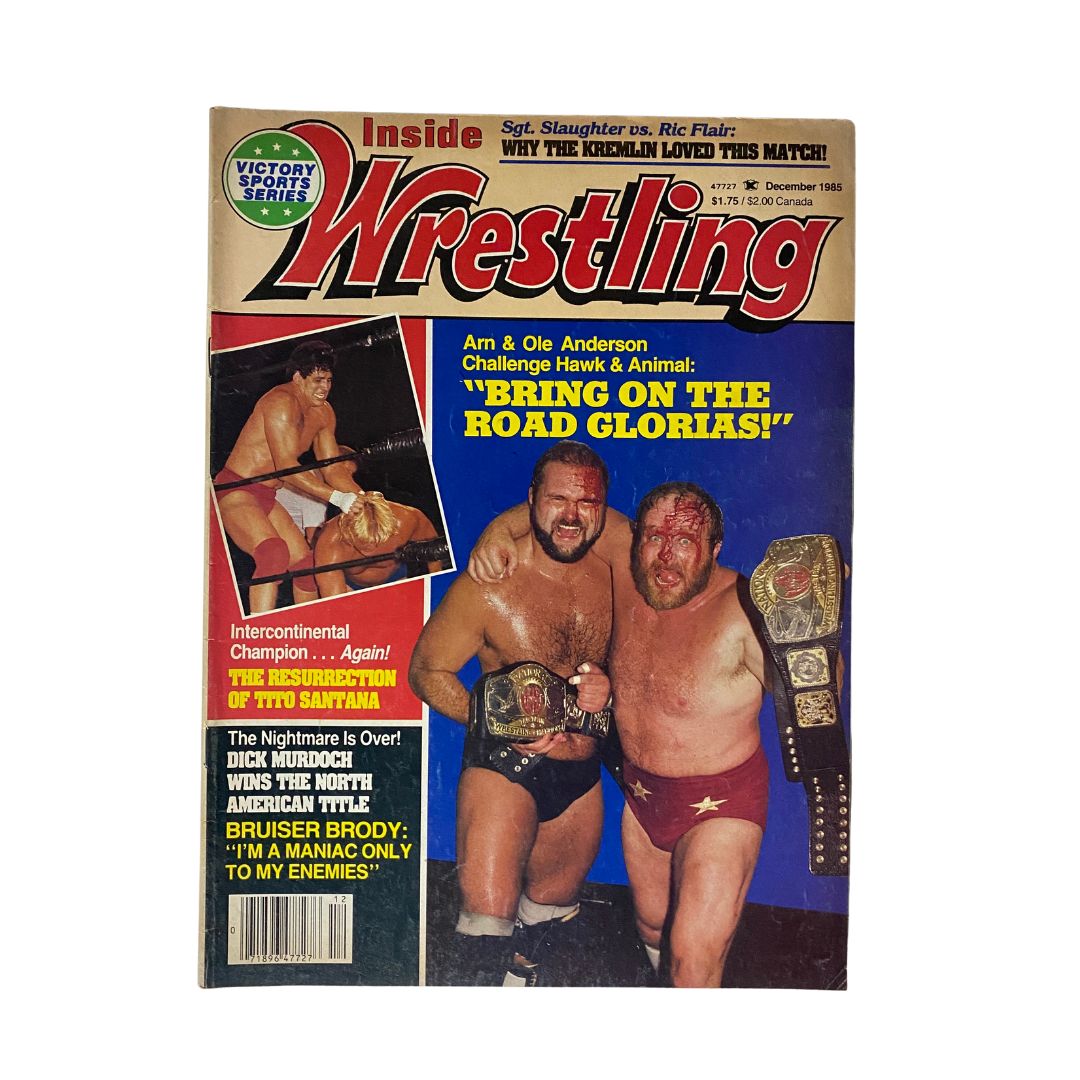 Cover of VTG Inside Wrestling Magazine December 1985 featuring Arn and Ole Anderson with championship belts, highlighting an iconic wrestling moment.
