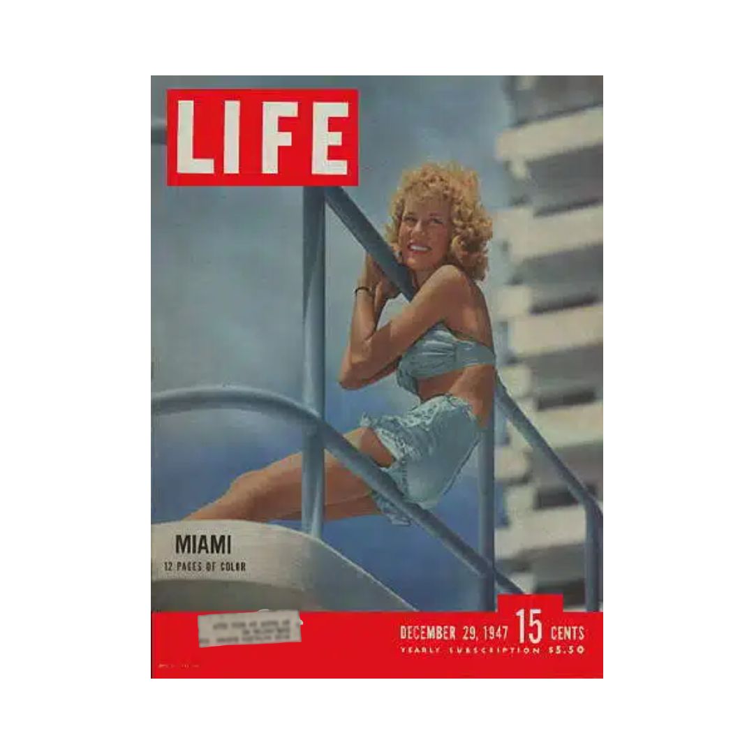 VTG Life Magazine December 29, 1947 Miami Florida featuring a woman in a blue outfit on a staircase with a vibrant Miami background.